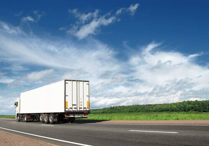 Dry van freight trailer on the highway